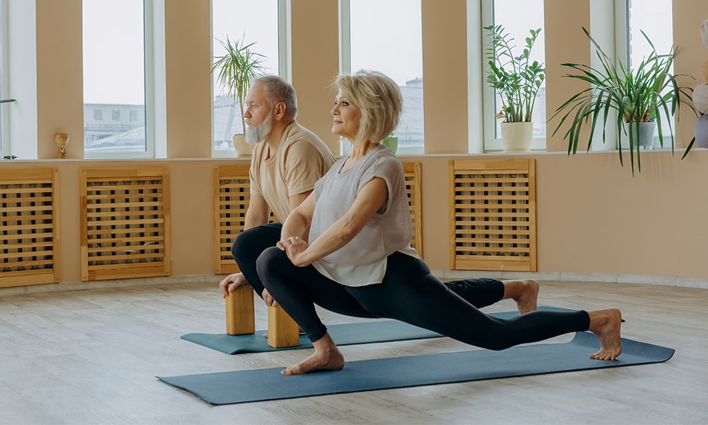 man and woman exercise