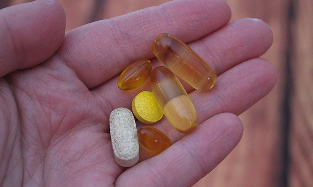 vitamins in hand